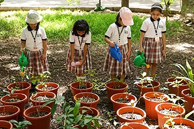 Gardening activities for hands-on learning and nature education featuring students with pots.