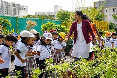 Nature walks for outdoor learning and student exploration led by a teacher in the garden.