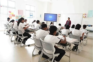 Smart classroom with digital visual boards for interactive learning and student engagement.