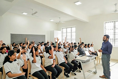 Students answering questions during a classroom activity that encourages decision-making