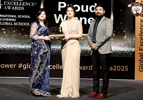 Educators receiving a global excellence award during an international school award ceremony