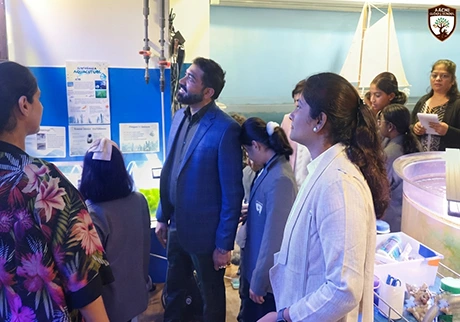 Students exploring an educational facility during an international school trip to Hong Kong