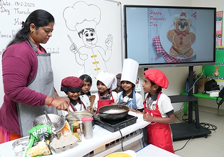 Children participating in cooking activities during school learning programs today for kids