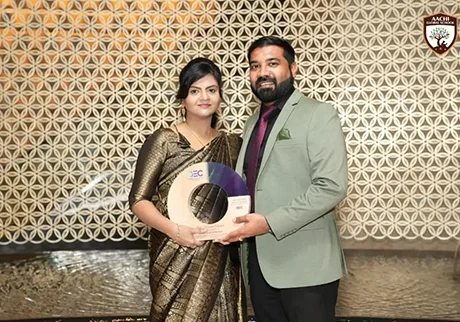 School representative receiving a prize during an educational recognition ceremony at school