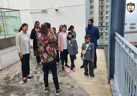 School students exploring Hong Kong during an international educational tour with peers today
