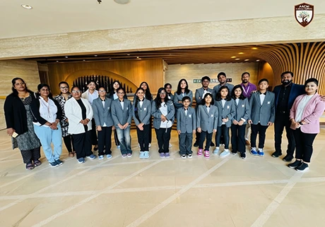 Students participating in an international school trip to Hong Kong with teachers and peers