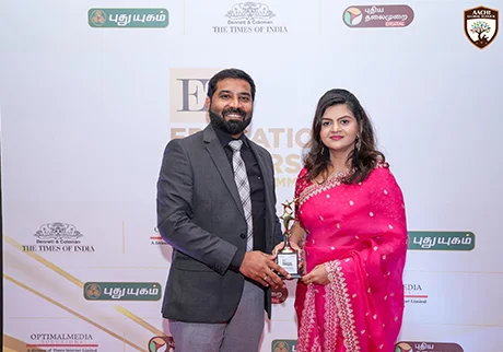 School representatives receiving recognition during an educational excellence award ceremony