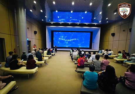 School students posing together during an educational international trip to Singapore today